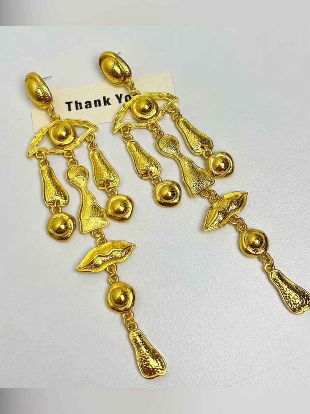 Schiaparelli Inspired Gold Sculptural Dangle Earrings with Eye & Lip Motifs